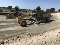 November 2019 – A grader and road roller smoothing a dirt road. For more information call (619) 688-6670 or email CT.Public.Information.D11@dot.ca.gov