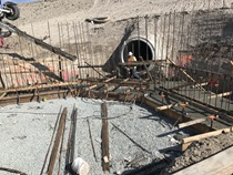 January 2020 – Construction worker preparing to pour concrete near a drainage pipe. For more information call (619) 688-6670 or email CT.Public.Information.D11@dot.ca.gov