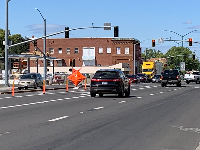 Photo of left turn lane that has been temporarily reduced to one lane during construction on State Highway 70 in Marysville