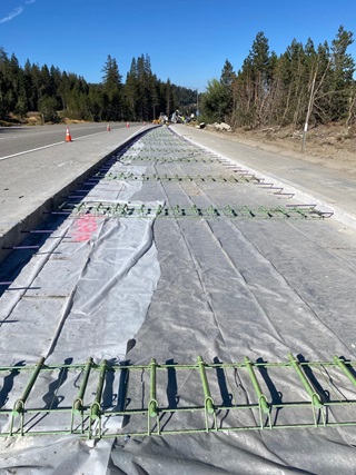 Rebar is laid along I-80 ramps in the Sierra prior to pouring new concrete slabs.