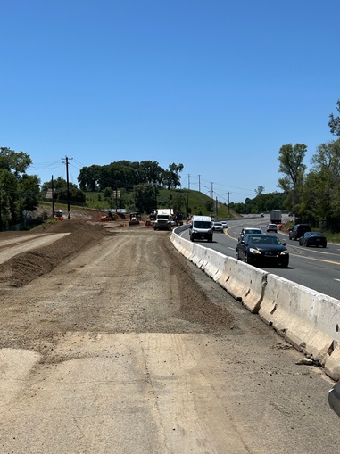 Drainage work along State Route 49 in Placer County as part of a safety barrier project.