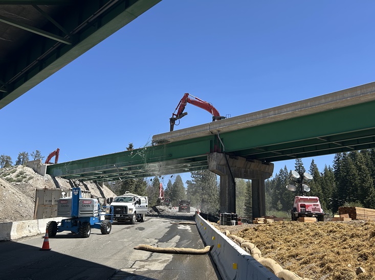 Construction crews begin demolition of eastbound bridge span as part of the Yuba Pass Separation Overhead Bridge Project.