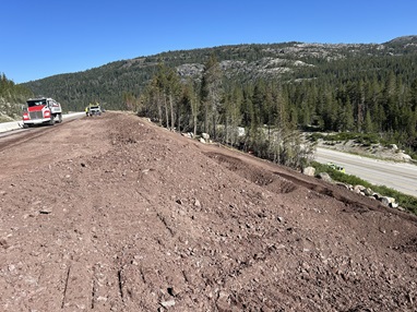 Construction crews performing work within the center median along Interstate 80 near Soda Springs as part of a pavement rehabilitation project.