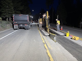 Construction crews working on draining along State Route 28 as part of a pavement rehabilitation project.