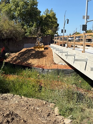 Concrete work along State Route 49 in Auburn on the new pedestrian bridge over Rock Creek.