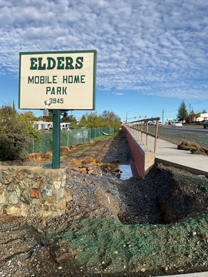 New sidewalk along State Route 49 near Elders Mobile Home Park in Auburn.