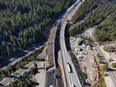 Concrete work for new eastbound bridge along Interstate 80 at the junction of State Route 20, as part of the Yuba Pass Separation Overhead Bridge Project.