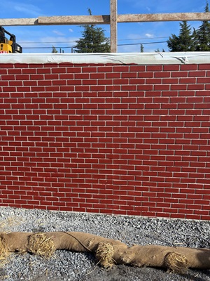 New retaining wall along State Route 49 in Auburn as part of a sidewalk gap closure project.