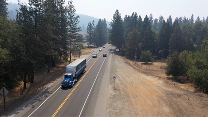 Traffic along State Route 49 south of Grass Valley, navigating the two lane segment with no room to safely pass slow moving vehicles.