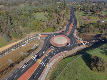 New roundabout along State Route 49 at Lone Star Road in Placer County, part of a newly completed safety barrier project.
