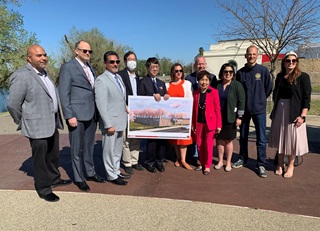 Group Photo with Hanami Line Project Rendering. Includes Japanese Consul General Hiroshi Kawamura, Congresswoman Doris Matsui, Sacramento Mayor Darrell Steinberg, Caltrans District 3 Director Amarjeet Benipal, and additional staff.