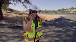 Caltrans worker on the phone 