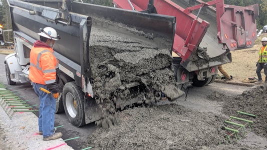 Crews pouring about 5,000 ft length of concrete pavement eastbound I-80 for new truck climbing lane at Baxter.