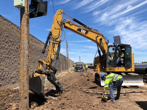 2021-05-07 Construction crews excavating