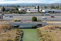 Aerial view of the Cordilleras Creek Bridge, located in Redwood City, San Mateo County.