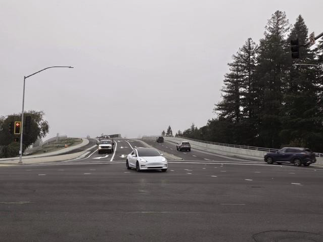 Cars travelling on the new Hearn Avenue overcrossing that has double the traffic lanes, double the sidewalks and three bicycle lanes where none existed before.