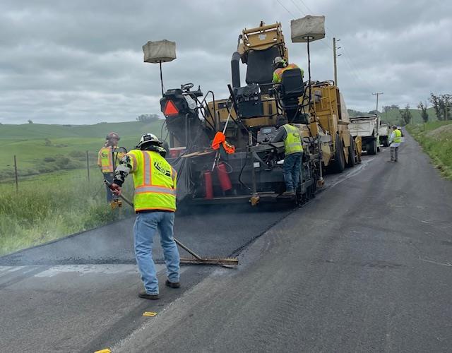 Caltrans workers and road paving equipment working on State Route 1 (SR-1)  Capital Preventive Maintenance Project in Marin County.