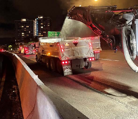 Caltrans , dump truck and cold milling machine working on overnight paving operations Interstate 80 between Carlson Boulevard in El Cerrito and Solano Avenue in Richmond.