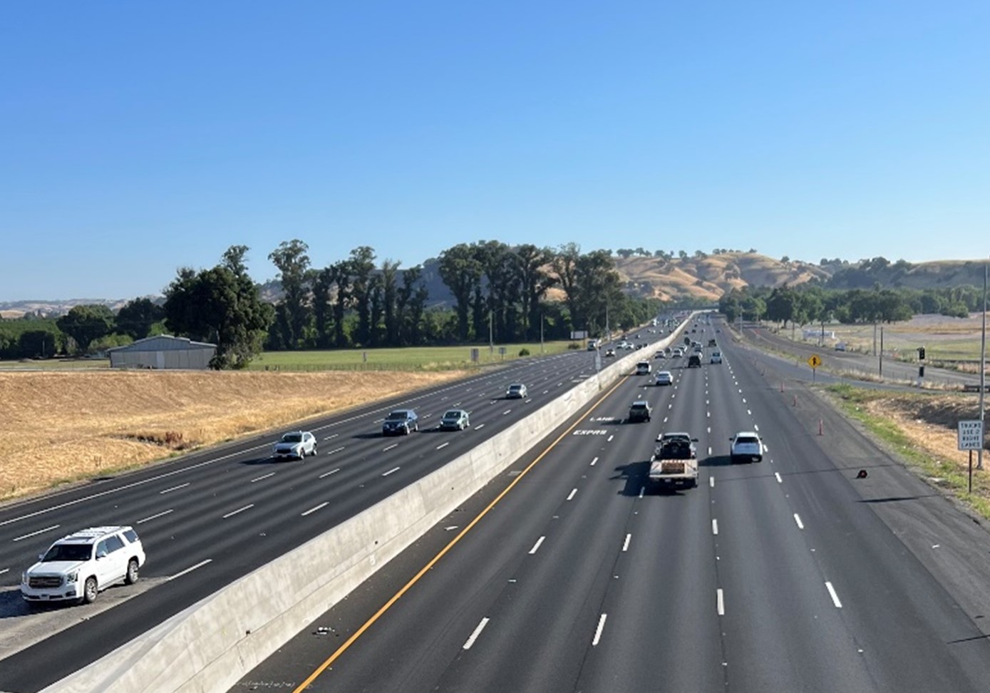 Cars traveling on Eastbound I-80 as Express Lane Opens as Temporary HOV Lane.