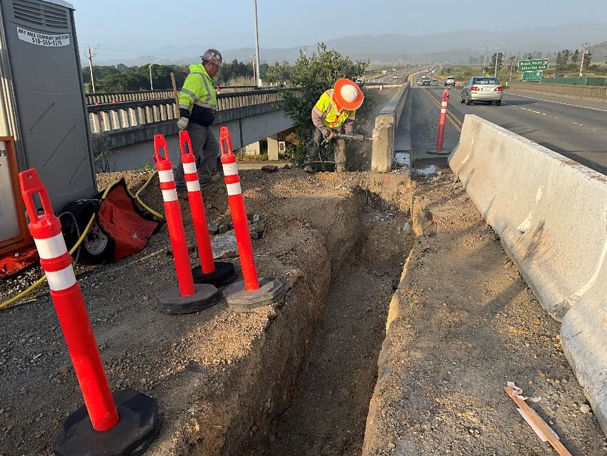 Caltrans workers perform construction work along State Route 37 in Marin County.