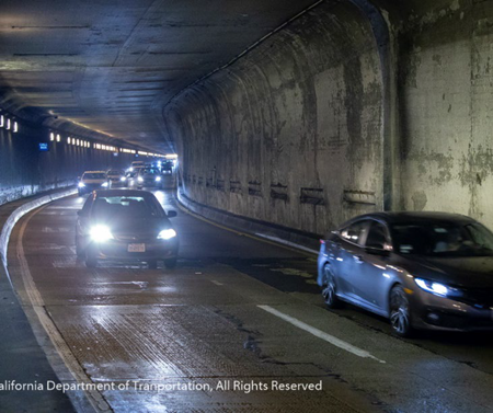 Vehicle traffic moves through the Caldecott Tunnel on State Route 24.