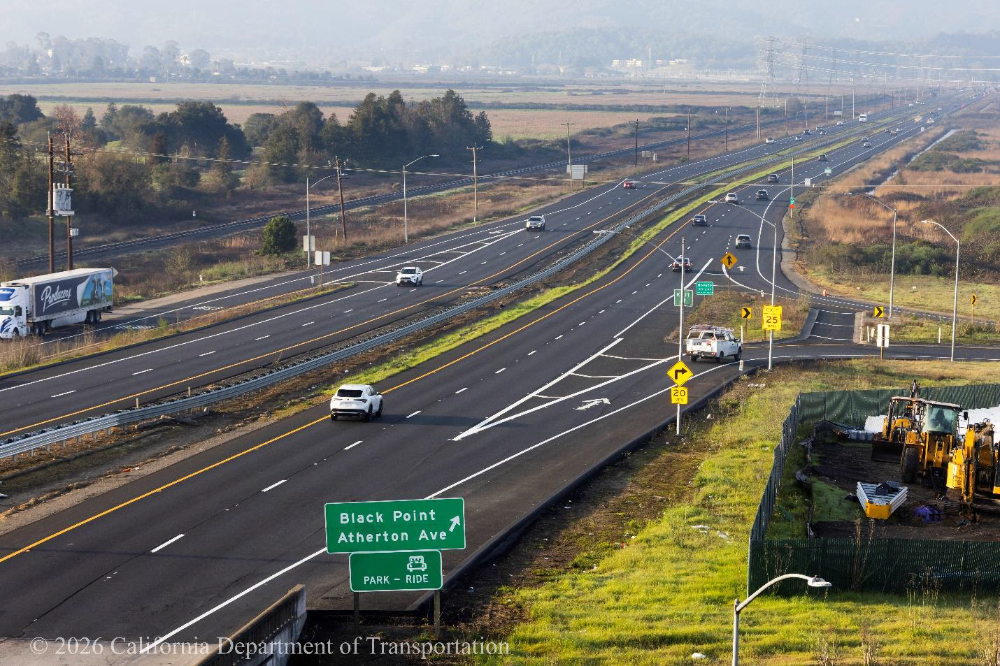 Cars traveling on State Route 37 at the US-101 interchange near SR-37, the Hanna Ranch Road exit and the Atherton Avenue exit along SR-37.