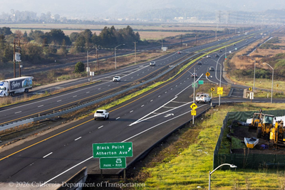 Cars traveling on State Route 37 at the US-101 interchange near SR-37, the Hanna Ranch Road exit and the Atherton Avenue exit along SR-37.