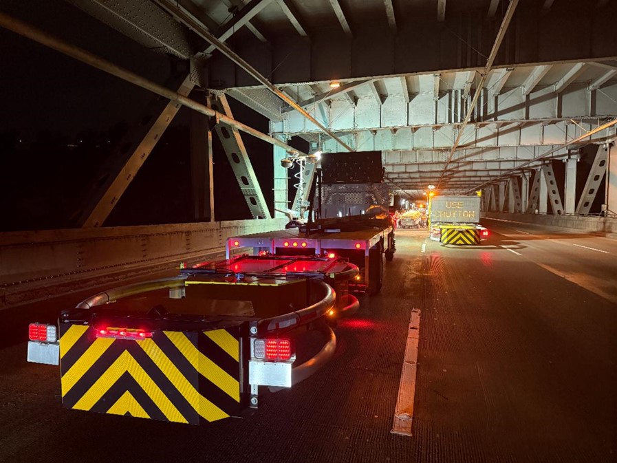 Caltrans trucks on the Bay Bridge as San Francisco–Oakland Bay Bridge (SFOBB) West Span Joint Rehabilitation Project Phase 2 is completed.