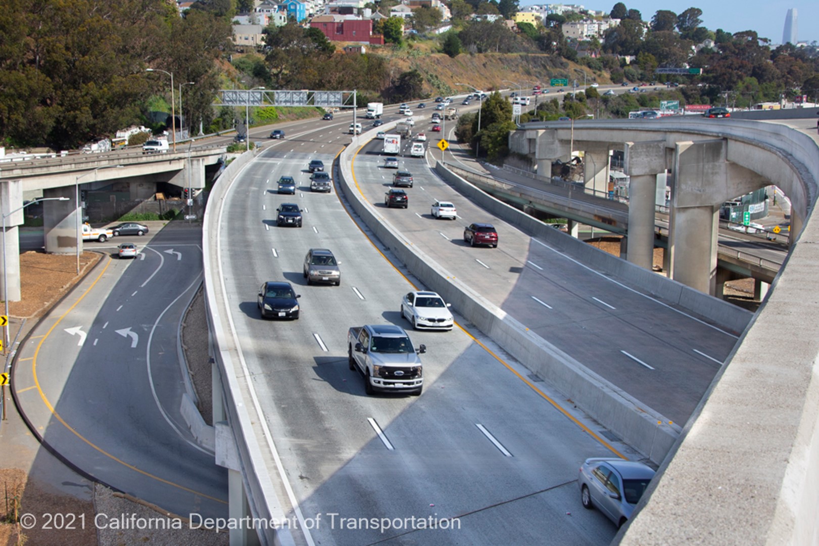 Cars traveling on Northbound and Southbound lanes on U.S. 101 Bayshore Freeway (Hospital Curve).
