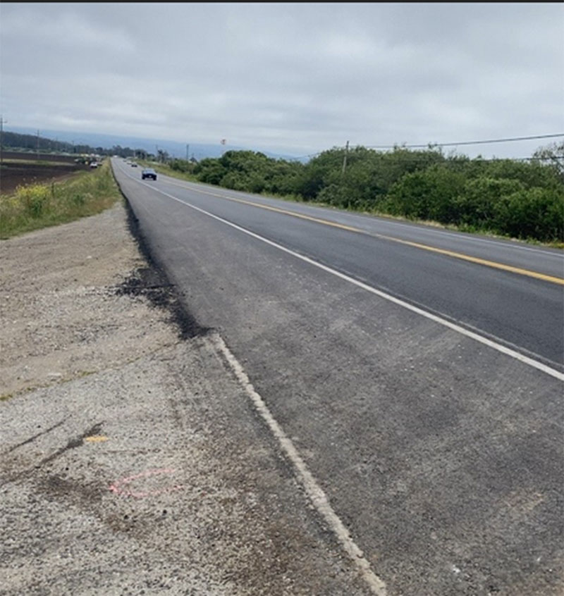 Cars traveling on newly paved road on SR-1 as progress continues on the SR-1 Multi-Asset Roadway Rehabilitation Project.