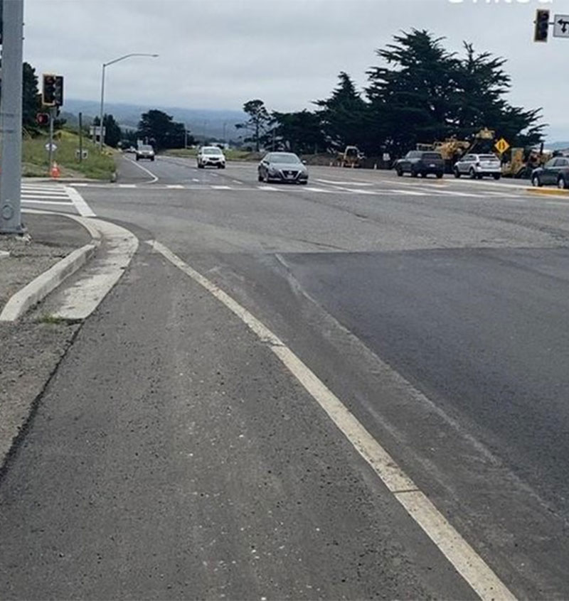 Cars traveling on newly paved road on SR-1 as progress continues on the SR-1 Multi-Asset Roadway Rehabilitation Project.