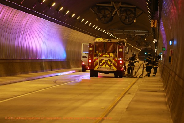 Firetrucks inside State Route 1 as agencies conduct its annual mandatory emergency response drill at the State Route 1 (SR-1) Tom Lantos (Devil’s Slide) Tunnels.