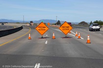 Cones and signs are used to mark the closure of westbound State Route 37 in Vallejo.