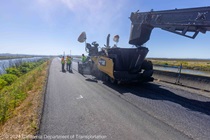 Caltrans crews install new pavement on westbound State Route 37 in Solano County on April 28, 2024.