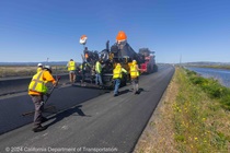 Caltrans crews install new pavement on westbound State Route 37 in Solano County on April 28, 2024.