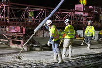 Caltrans workers installing new concrete as part of the bridge deck resurfacing on Interstate 680.