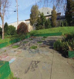 Image for the City of Richmond's Communities Clean Collaborative local grant project. Image shows a park with graffiti that would be cleaned as part of the project.