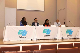 Panelists speak to the audience in the auditorium at the 2024 Equity Expo at Caltrans District 4.
