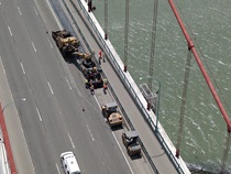 Aerial photo showing construction equipment in the right-most lane of of the Alfred Zampa Memorial (Carquinez) Bridge on August 20, 2026.