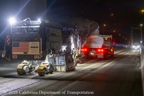 Heavy equipment and trucks are used to remove the roadway surface on the Alfred Zampa Memorial (Carquinez) Bridge on the night of August 21, 2026.