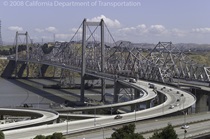 Looking north towards the Carquinez Bridge. Traffic travels off the western span in the foreground.