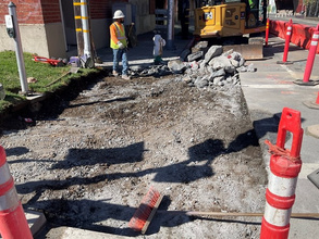 Caltrans crew setting up barriers and cones to widen the Oak Street off ramp, as the Oakland Alameda Access project begins.