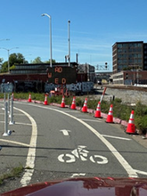 Cones along a bike path as the Oakland Alameda Access project begins.