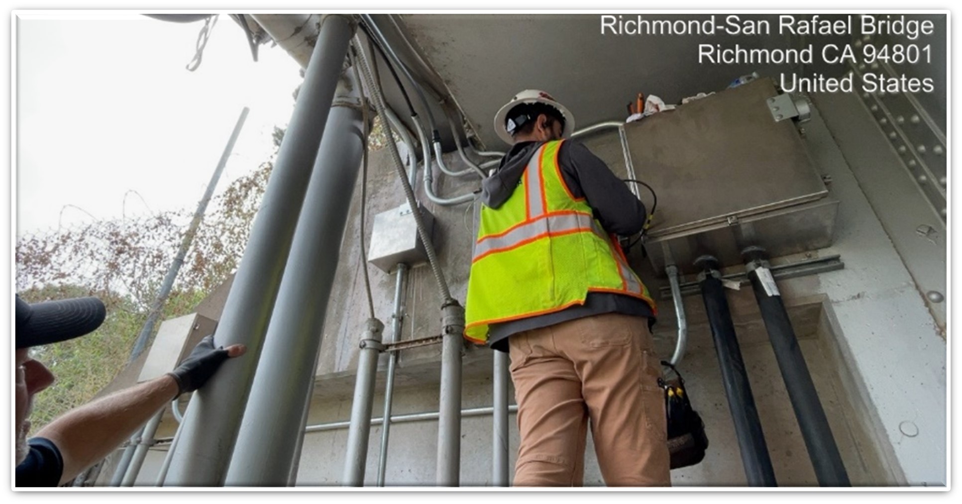 Caltrans working on the Richmond-San Rafael Bridge, replacing wiring  to restore essential power and communication systems damaged by vandalism and theft to ensure bridge lighting, navigation, and safety systems remain operational.