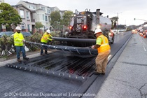 Caltrans using heavy equipment to resurface the existing asphalt pavement on Northbound 19th Avenue from Sloat Boulevard to Lincoln Way as work continues on the 19th Avenue Paving and Rehabilitation project.
