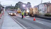 Caltrans worker directing traffic as Caltrans is resurfacing the existing asphalt pavement on Northbound 19th Avenue from Sloat Boulevard to Lincoln Way as work continues on the19th Avenue Paving and Rehabilitation project.
