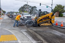 Caltrans using heavy equipment to resurface the existing asphalt pavement at an intersection on Northbound 19th Avenue from Sloat Boulevard to Lincoln Way as work continues on the 19th Avenue Paving and Rehabilitation project.