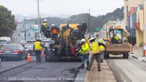 Cars traveling on newly resurfaced asphalt roadway on 19th Avenue (State Route 1) as Caltrans crew and heavy equipment is resurfacing the second lane on Northbound 19th Avenue from Sloat Boulevard to Lincoln Way as work continues on the 19th Avenue Paving and Rehabilitation project.