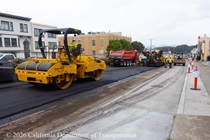Cars traveling on newly resurfaced asphalt roadway on 19th Avenue (State Route 1) as Caltrans crew and heavy equipment is resurfacing the second lane on Northbound 19th Avenue from Sloat Boulevard to Lincoln Way as work continues on the 19th Avenue Paving and Rehabilitation project.