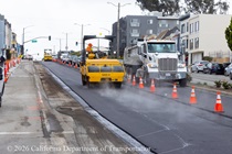 Cars traveling on newly resurfaced asphalt roadway on 19th Avenue (State Route 1) as Caltrans crew and heavy equipment is resurfacing the second lane on Northbound 19th Avenue from Sloat Boulevard to Lincoln Way as work continues on the 19th Avenue Paving and Rehabilitation project.